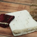 Elegant Off-White Saree with Maroon Blouse